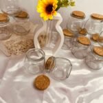 جرة  زجاج  مع غطاية فلين لصب الشمع او للتوزيعات